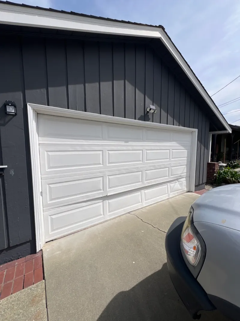 Technician responding to an emergency garage door repair